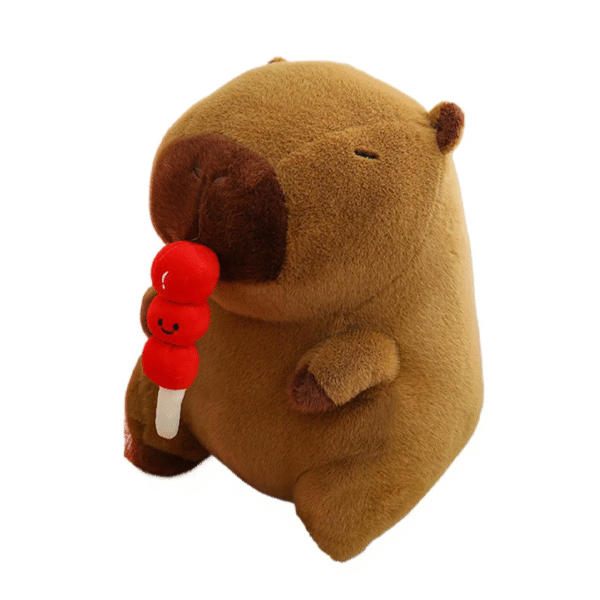 Peluche Capibara con comiendo